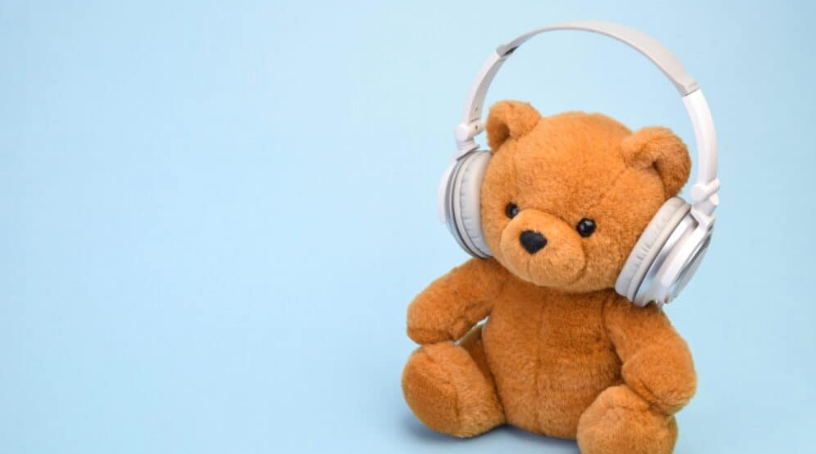 Photo of teddy bear with headphones on 