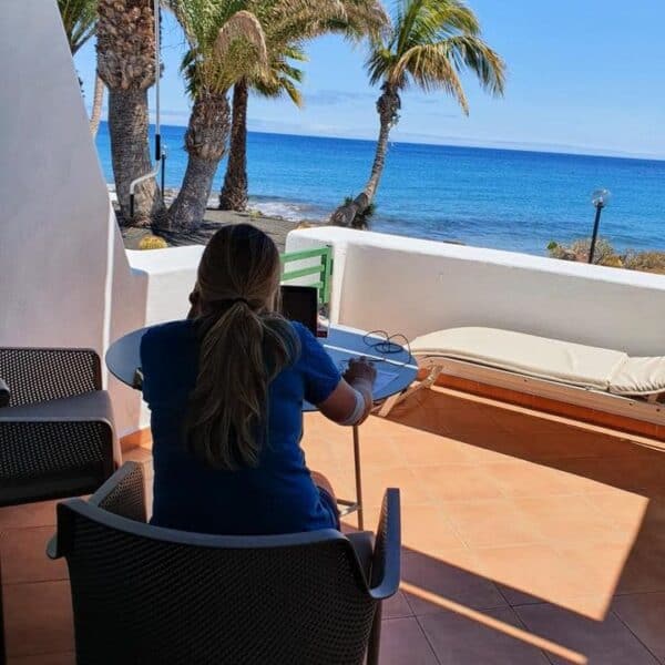 Helen working on her blog in Lanzarote